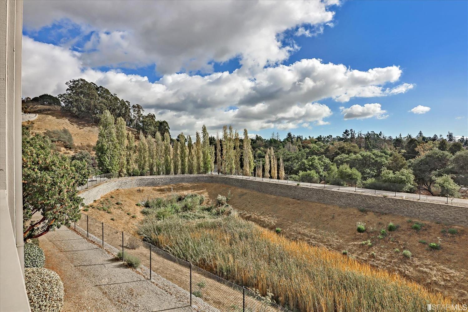 6010 Old Quarry Loop Oakland, CA 94605 - Photo 32 of 32 a view of a yard with wooden fence