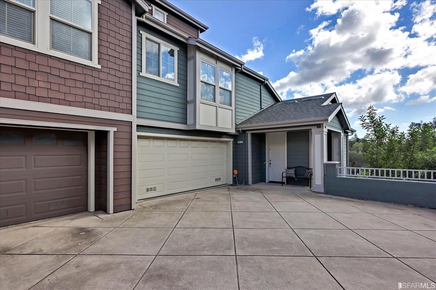 6010 Old Quarry Loop Oakland, CA 94605 - Photo 5 of 32 a view of a house with a garage