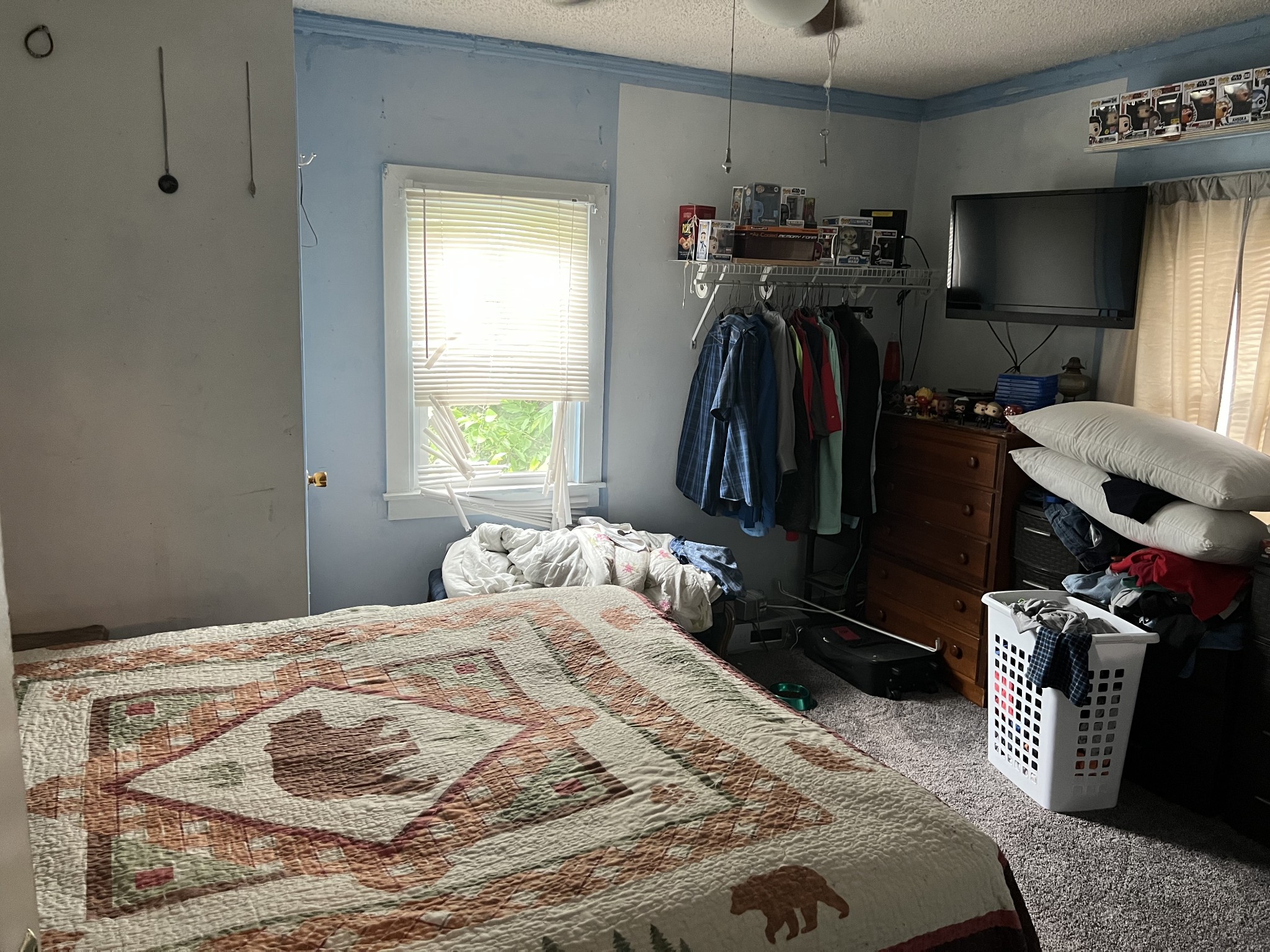 104 Lanier Drive Madison, TN 37115 - Photo 13 of 20 a bedroom with a bed and a flat tv screen