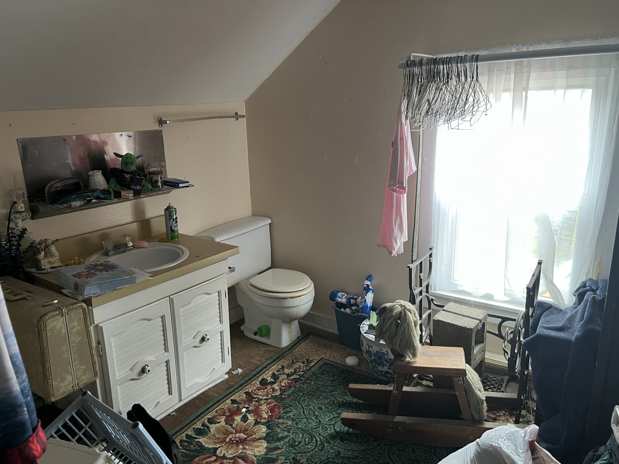 104 Lanier Drive Madison, TN 37115 - Photo 18 of 20 a bathroom with a granite countertop sink a toilet and a mirror