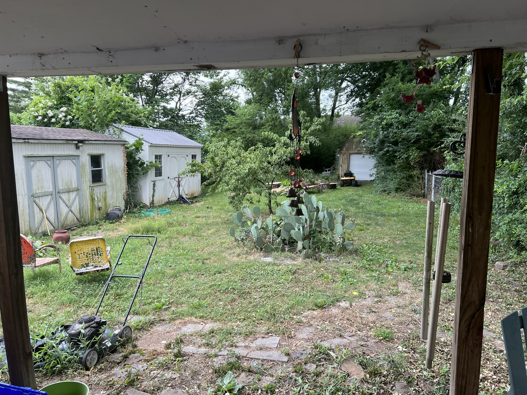 104 Lanier Drive Madison, TN 37115 - Photo 4 of 20 a view of a house with a backyard and garden