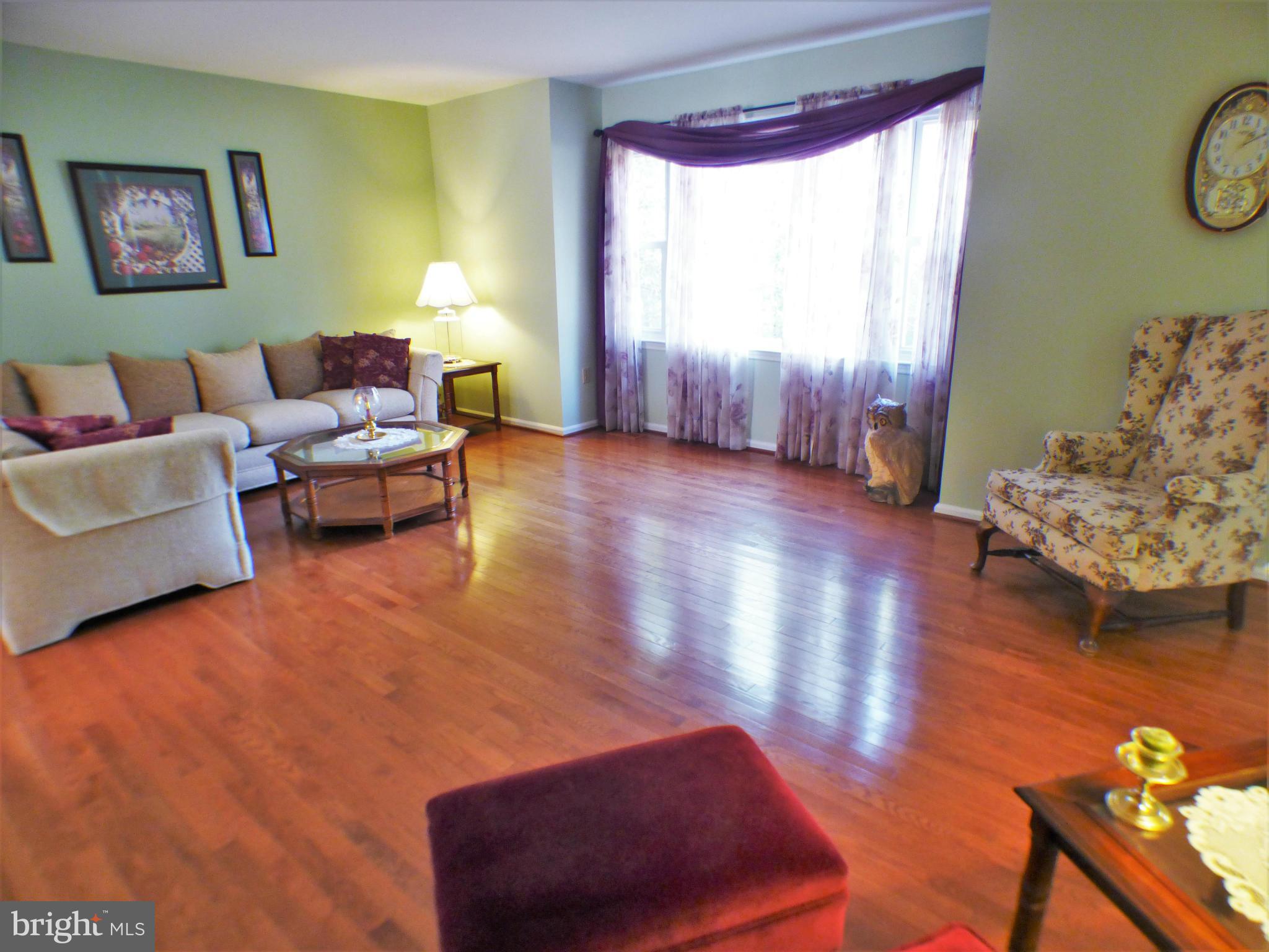 1521 Stinnett Road Huntingtown, MD 20639 - Photo 4 of 30 a living room with furniture and a window