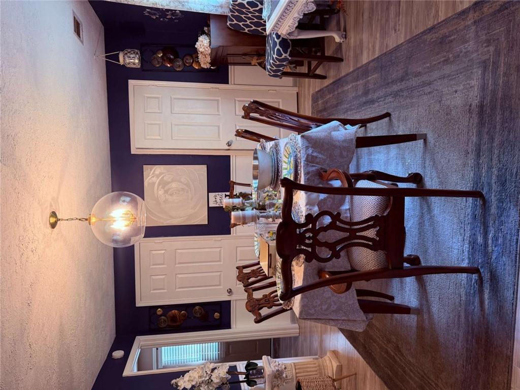 1972 Mt Zion Road Oxford, GA 30054 - Photo 8 of 15 a view of a dining room with furniture window and wooden floor