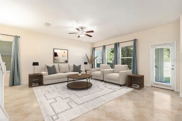 a kitchen with stainless steel appliances granite countertop a refrigerator stove microwave and cabinets