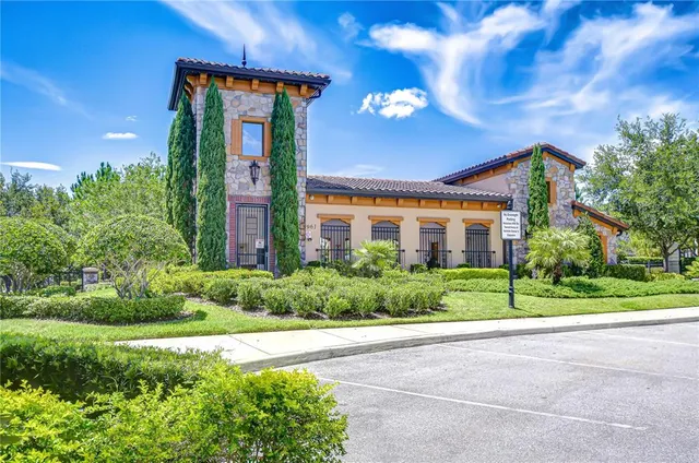 a view of a swimming pool with lounge chairs