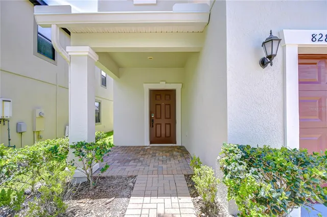 a front view of a house with a garage