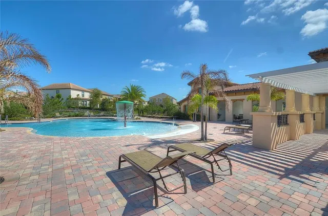 an aerial view of house with yard