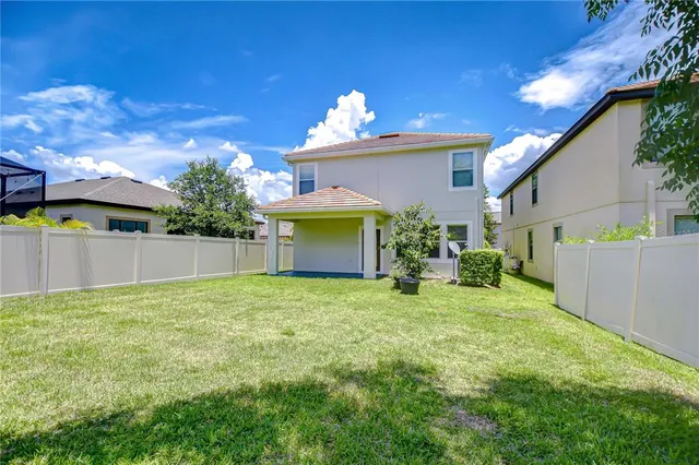 a view of backyard with green space