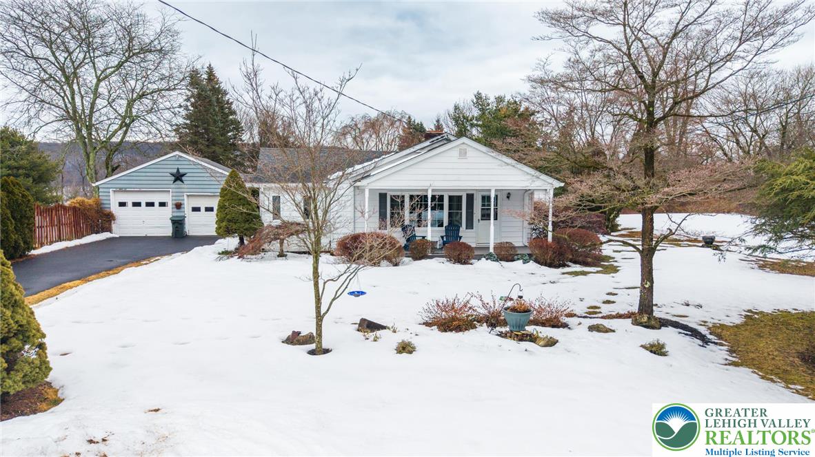 100 Ridge Road Phillipsburg, NJ 08865 - Photo 2 of 40 a view of a house with a yard covered in snow