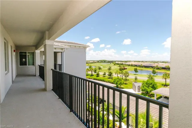a view of a balcony with an ocean view