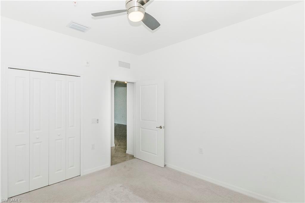 6034 National Boulevard, Unit 544 Ave Maria, FL 34142 - Photo 9 of 48 a view of an empty room