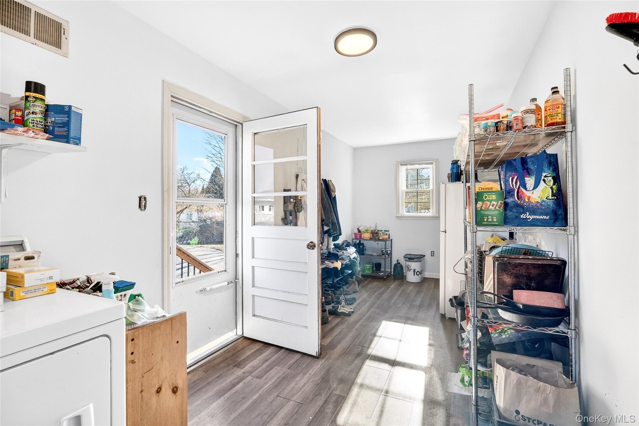 7 O Sullivan Lane Monroe, NY 10950 - Photo 19 of 43 a living room with furniture and a book shelf