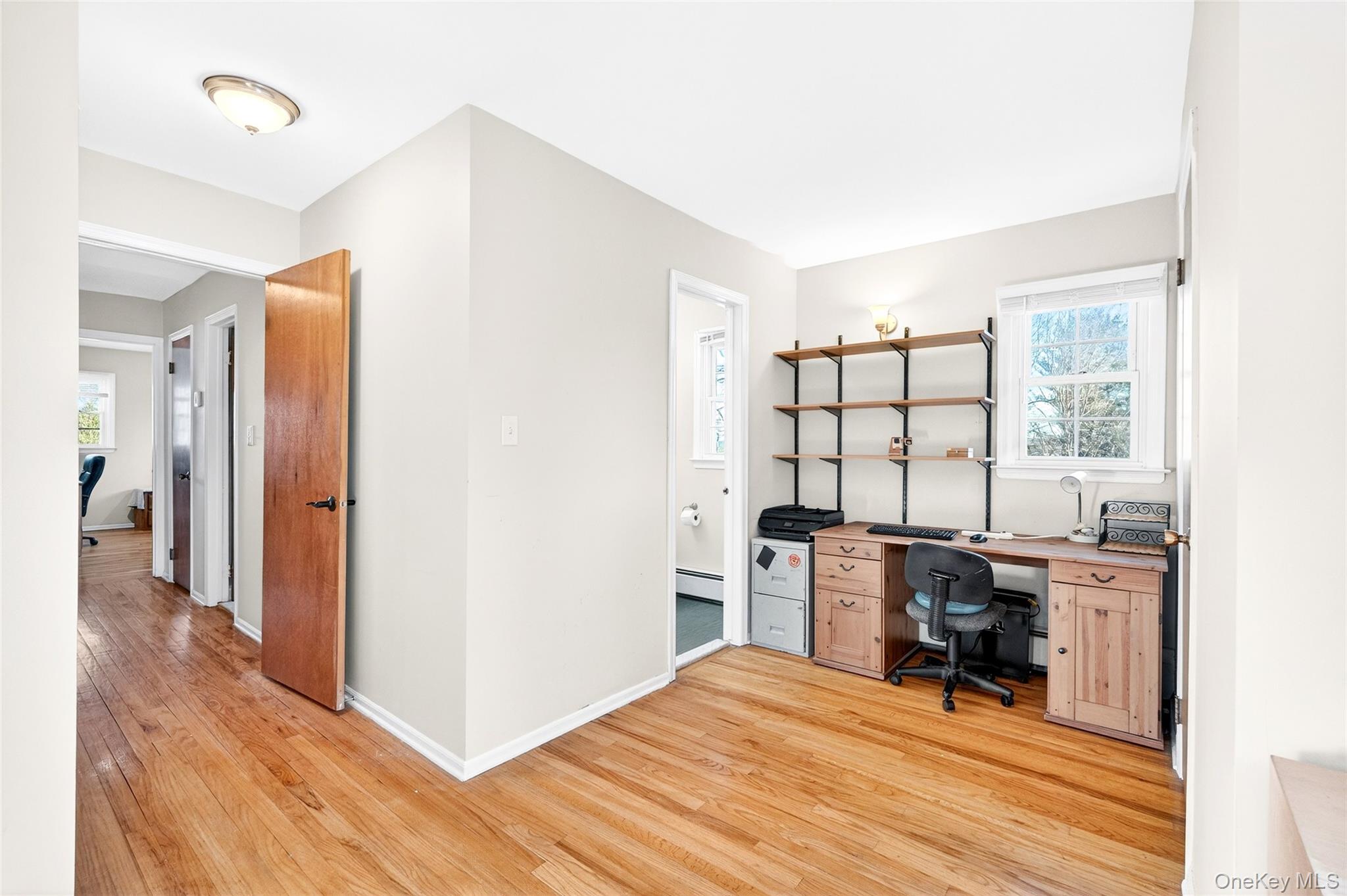 7 O Sullivan Lane Monroe, NY 10950 - Photo 24 of 43 a view of a bedroom with workspace and a window
