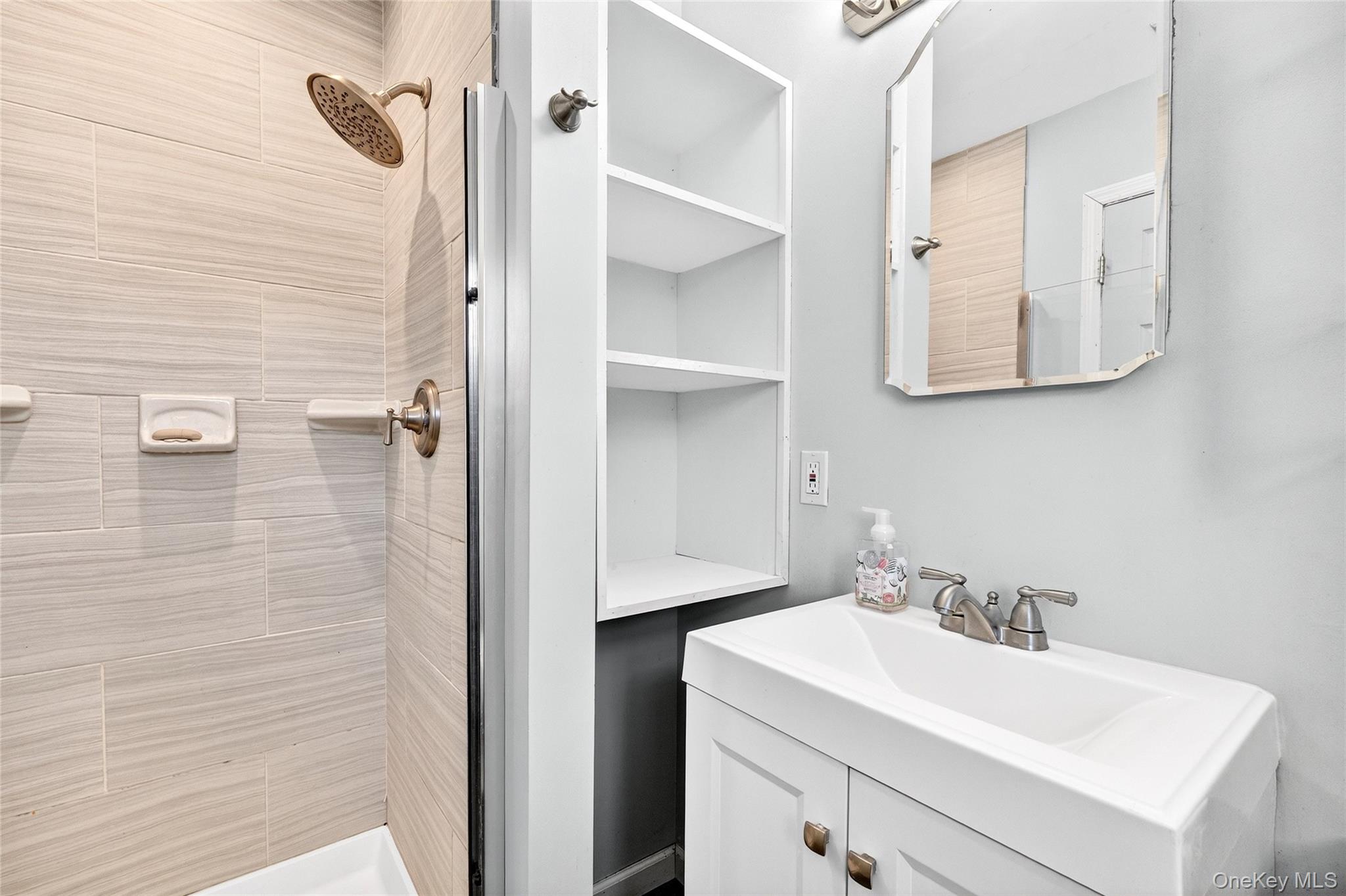 7 O Sullivan Lane Monroe, NY 10950 - Photo 25 of 43 a bathroom with a sink and mirror