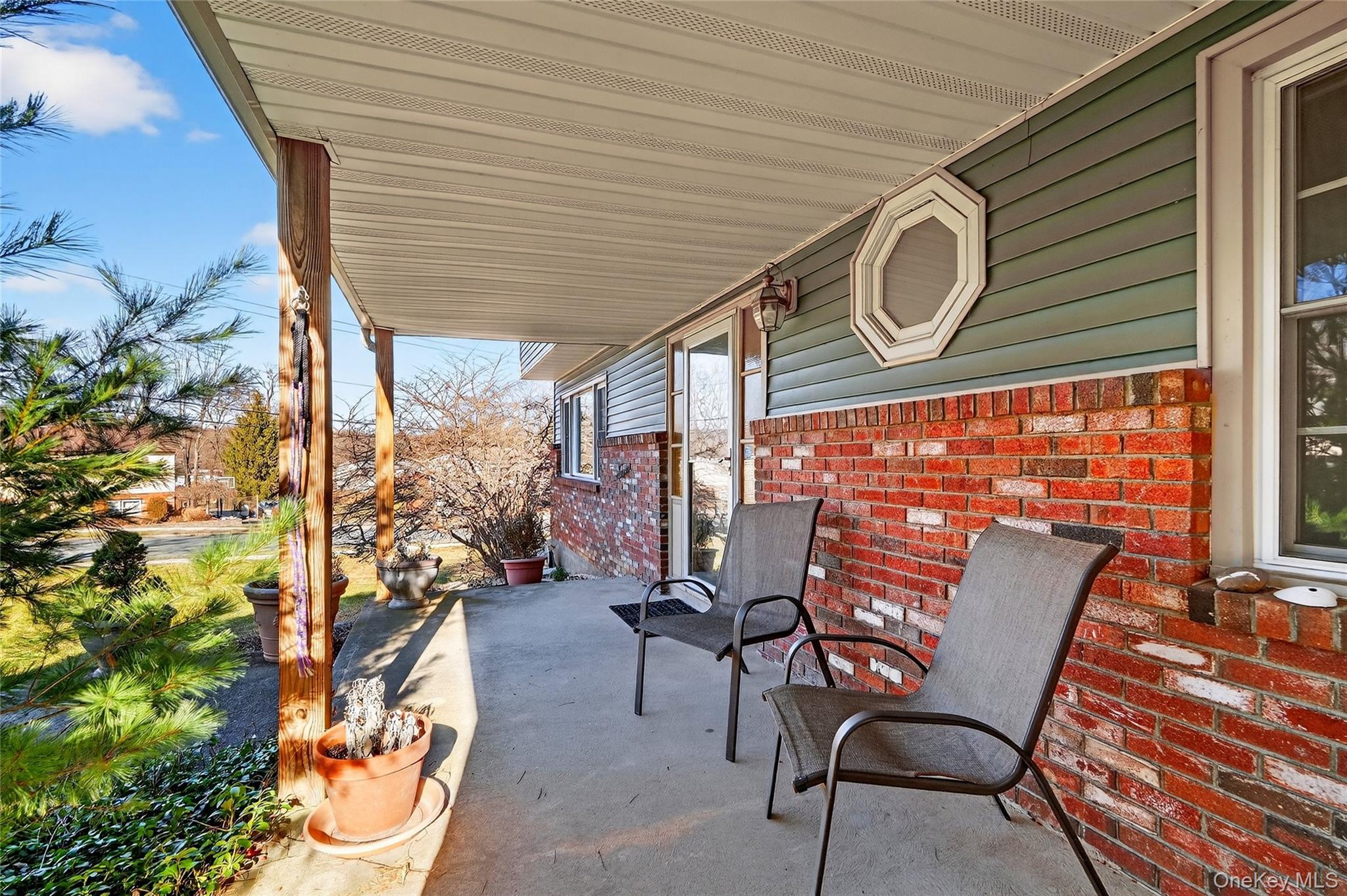 7 O Sullivan Lane Monroe, NY 10950 - Photo 3 of 43 a view of a chairs and table in the balcony