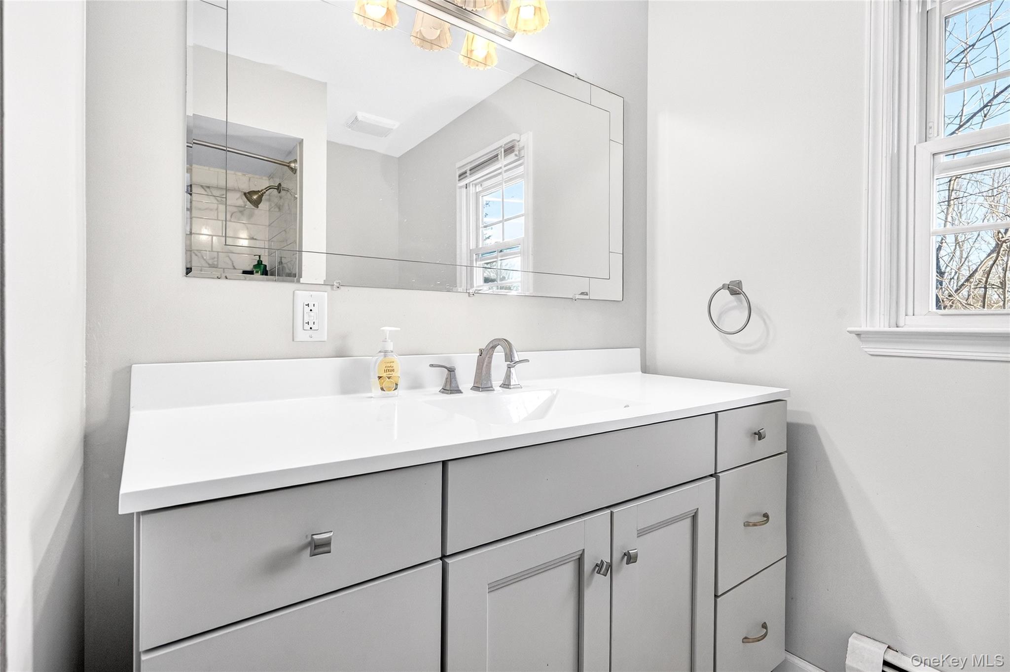 7 O Sullivan Lane Monroe, NY 10950 - Photo 31 of 43 a bathroom with a sink and a mirror