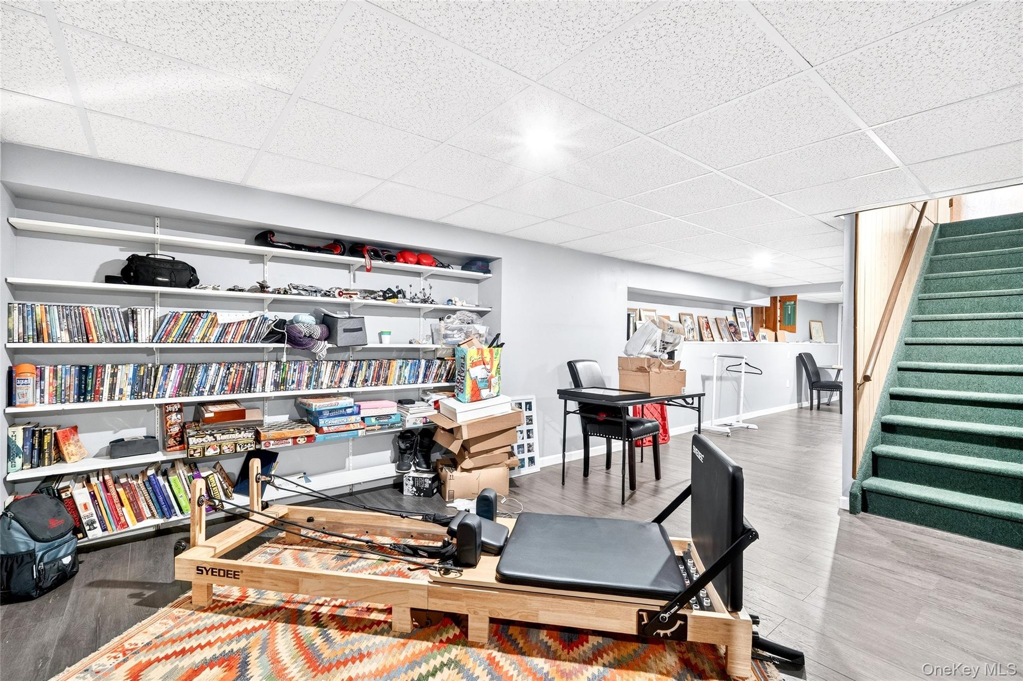 7 O Sullivan Lane Monroe, NY 10950 - Photo 32 of 43 a living room with furniture and a book shelf