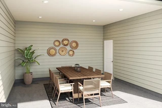 a view of a chairs and table in a patio