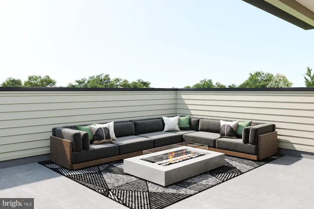 a view of patio with furniture