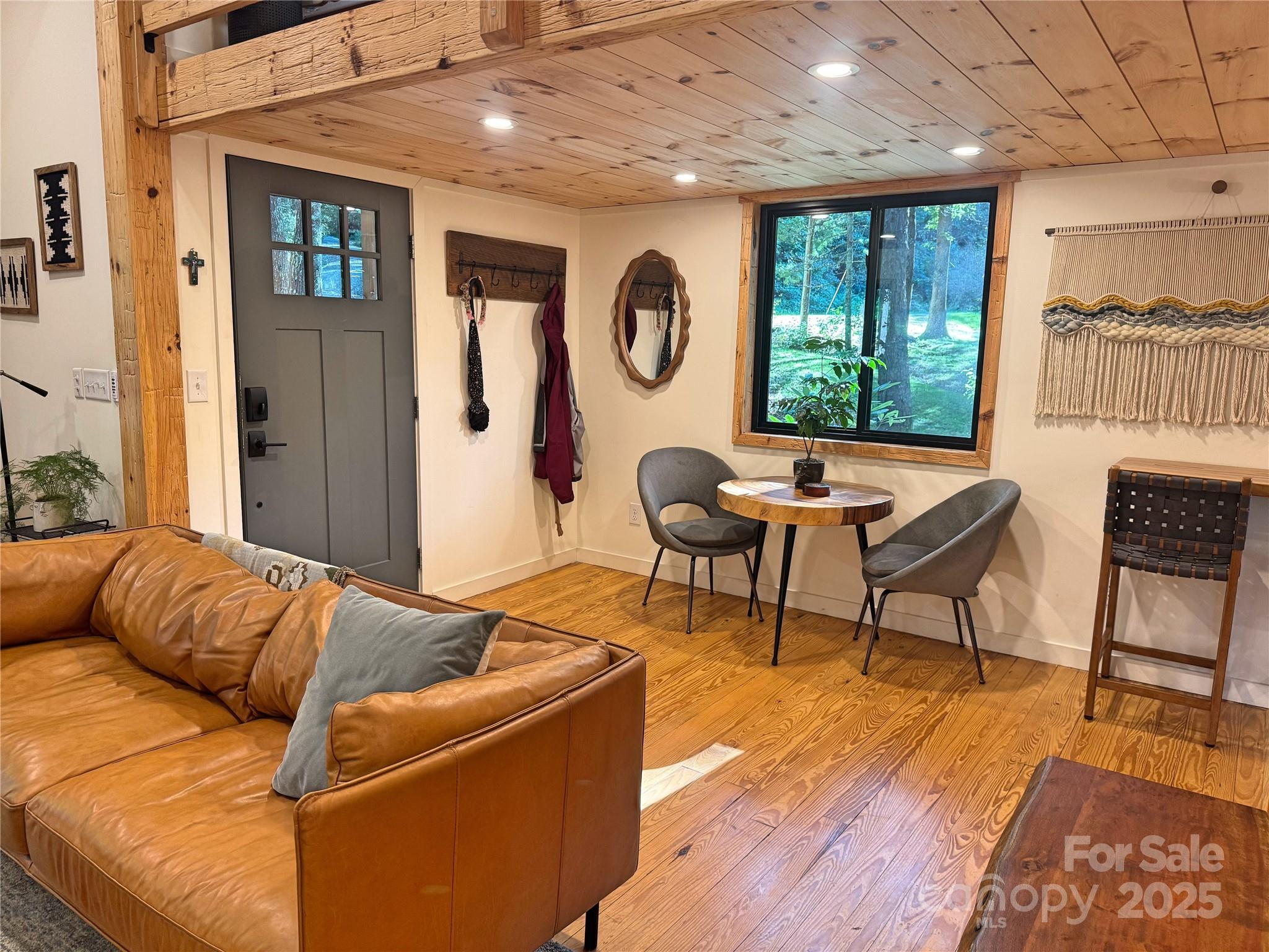 6622 Gingercake Road Newland, NC 28657 - Photo 16 of 48 a living room with furniture and a window