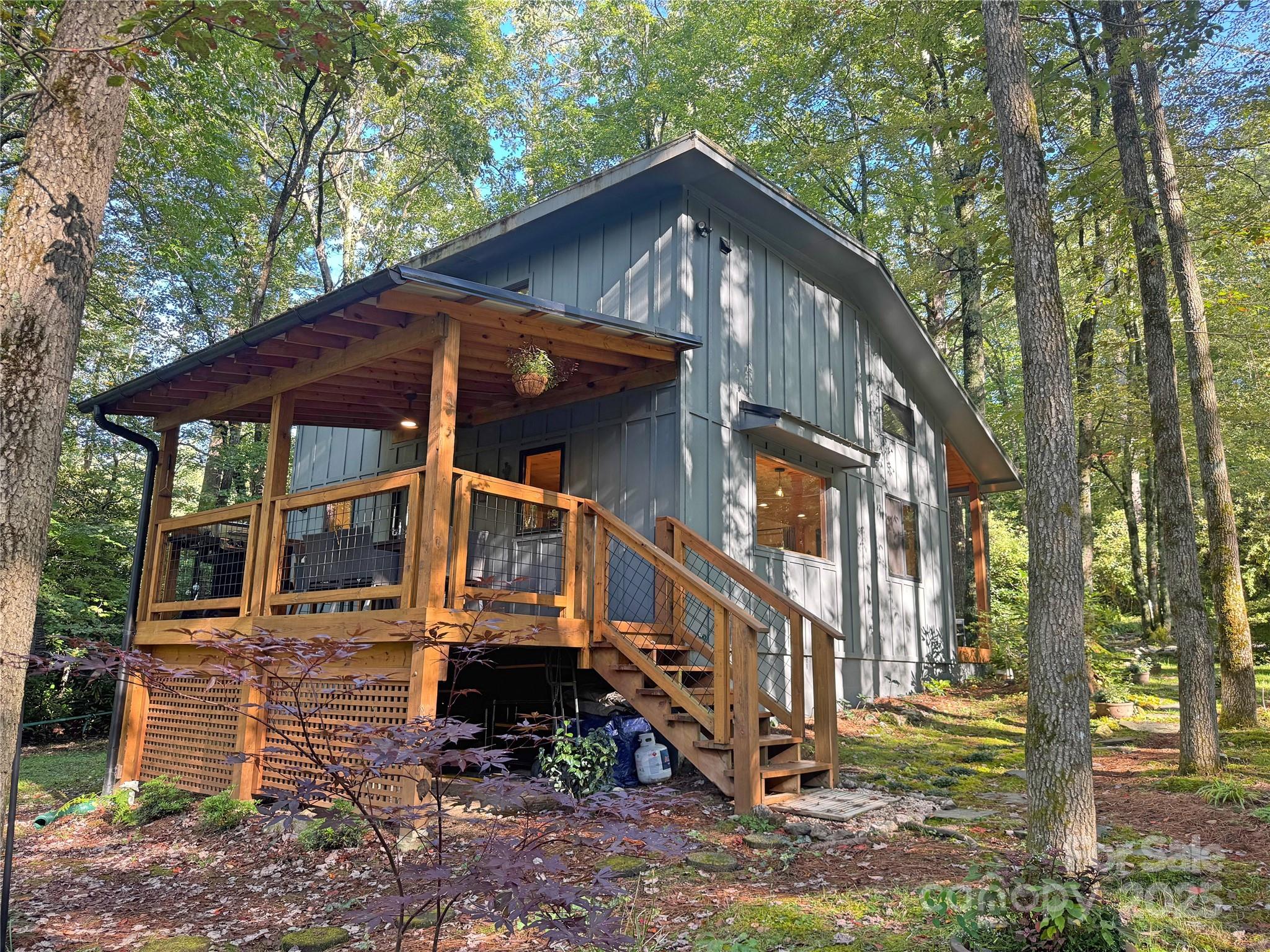 6622 Gingercake Road Newland, NC 28657 - Photo 2 of 48 a front view of a house with garden