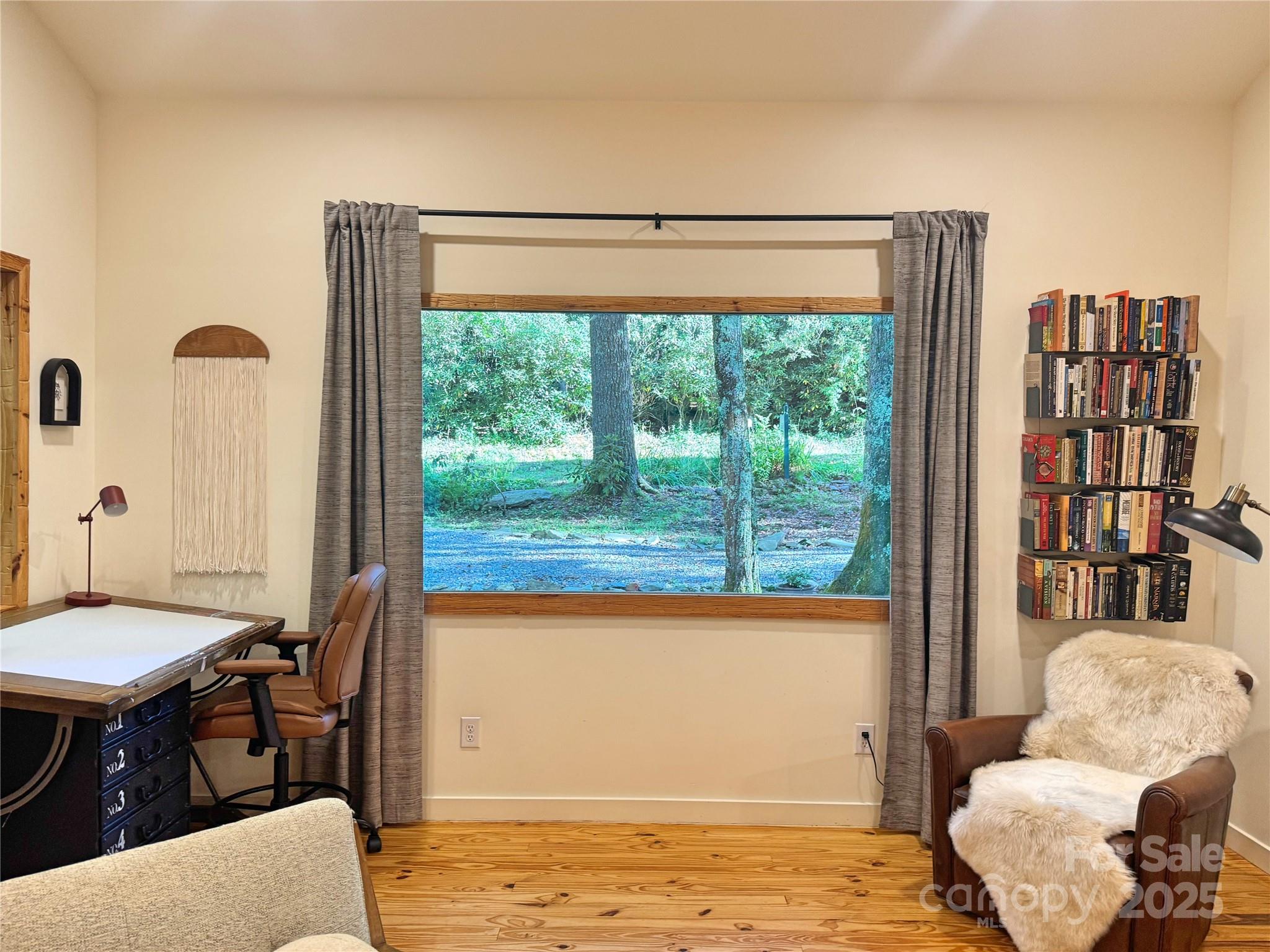 6622 Gingercake Road Newland, NC 28657 - Photo 22 of 48 a living room with furniture and a window