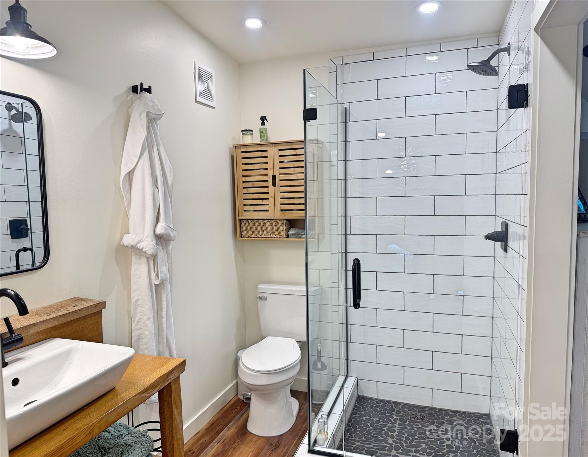 6622 Gingercake Road Newland, NC 28657 - Photo 40 of 48 a bathroom with a toilet and a shower