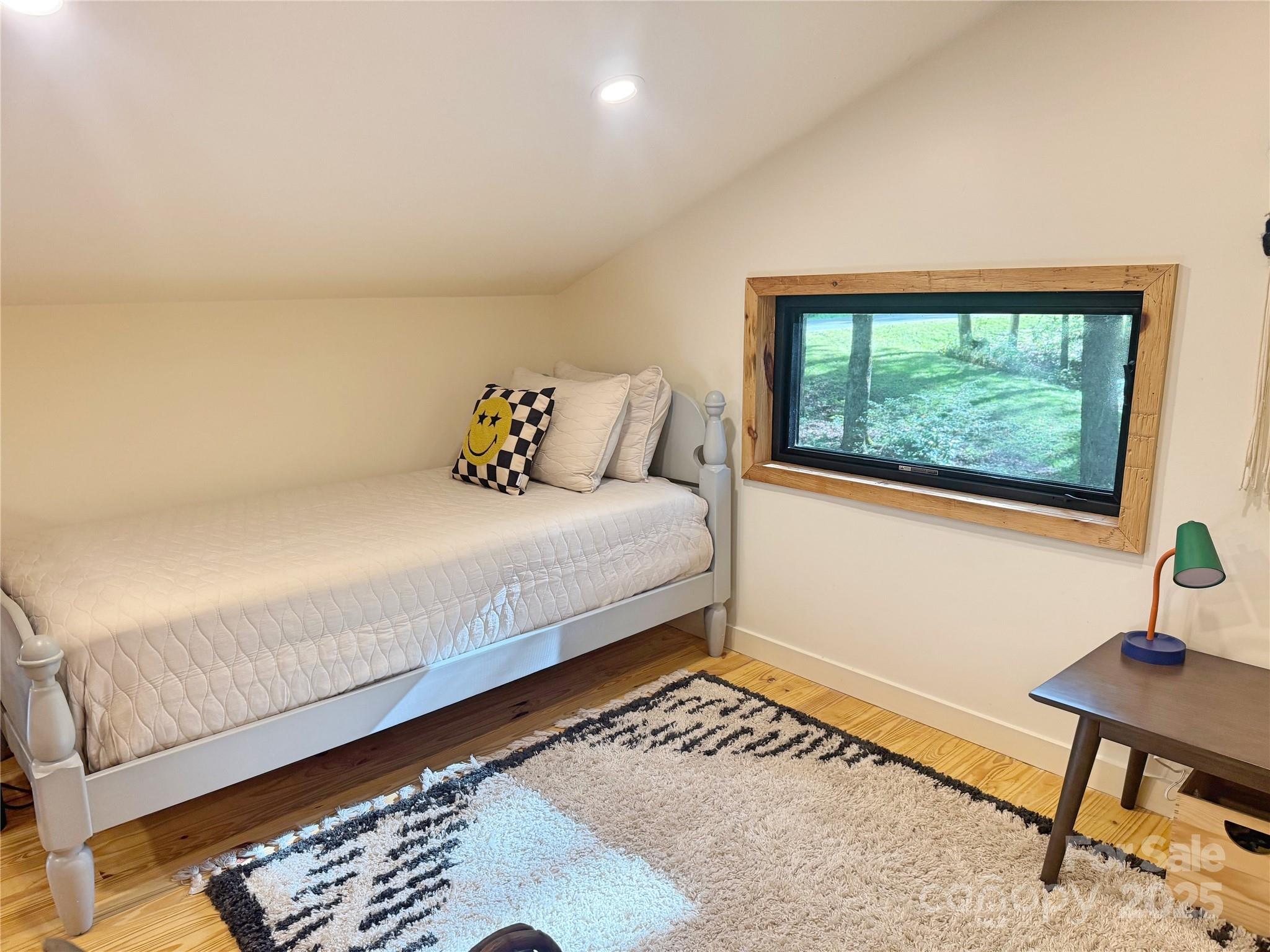 6622 Gingercake Road Newland, NC 28657 - Photo 41 of 48 a bedroom with a bed and a window