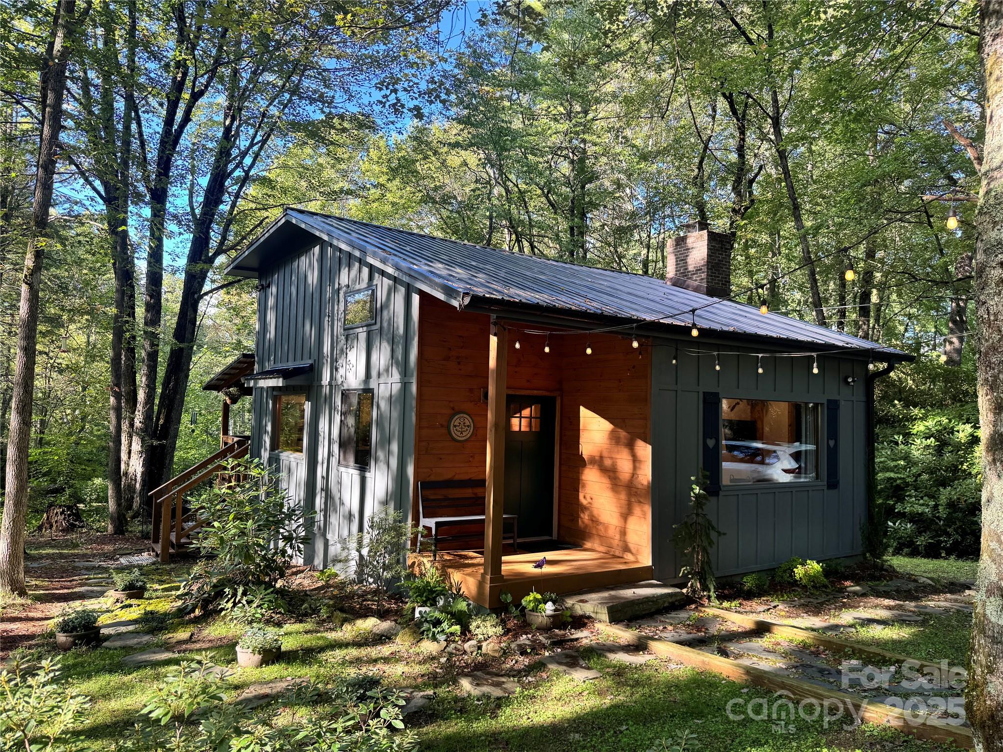 6622 Gingercake Road Newland, NC 28657 - Photo 6 of 48 a view of a house with yard and tree s