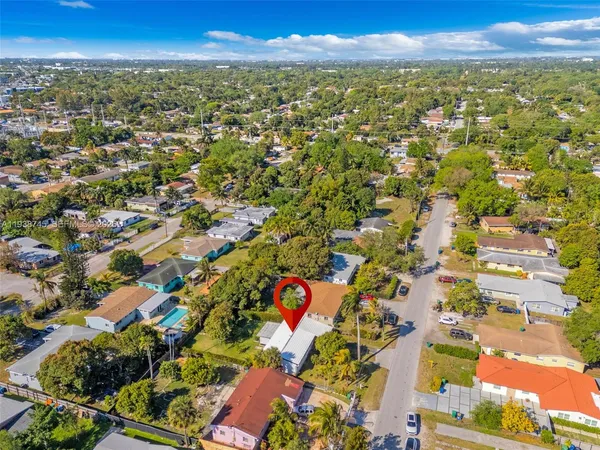 an aerial view of residential building with city view