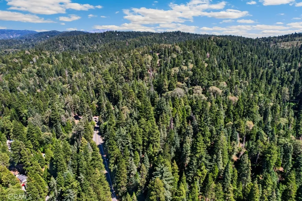 0 Ca-189 Twin Peaks, CA 92391 - Photo 10 of 12 a view of a city with lush green forest