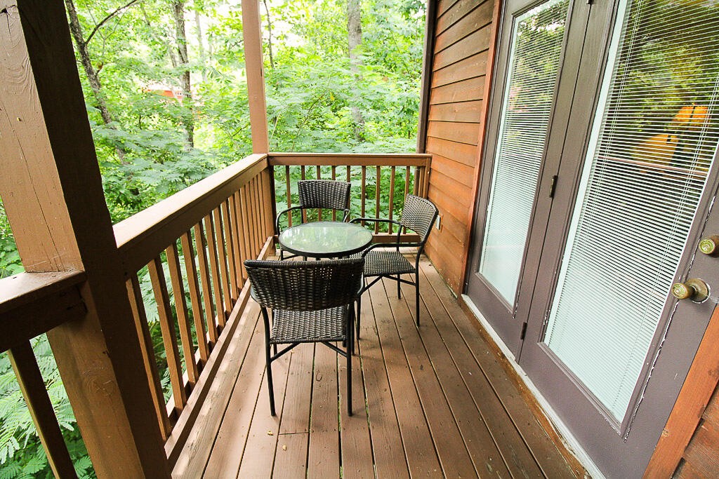 443 Loop Road Gatlinburg, TN 37738 - Photo 37 of 40 a view of a two chairs in the balcony