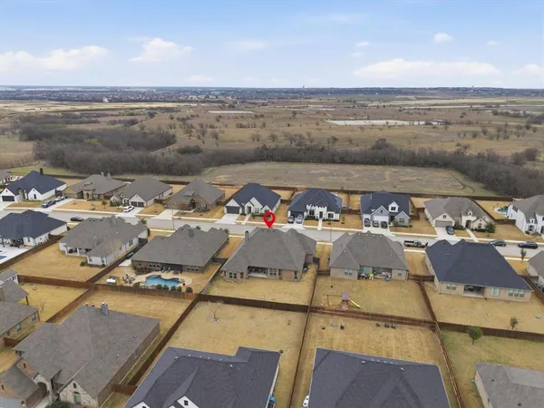an aerial view of a building with outdoor space