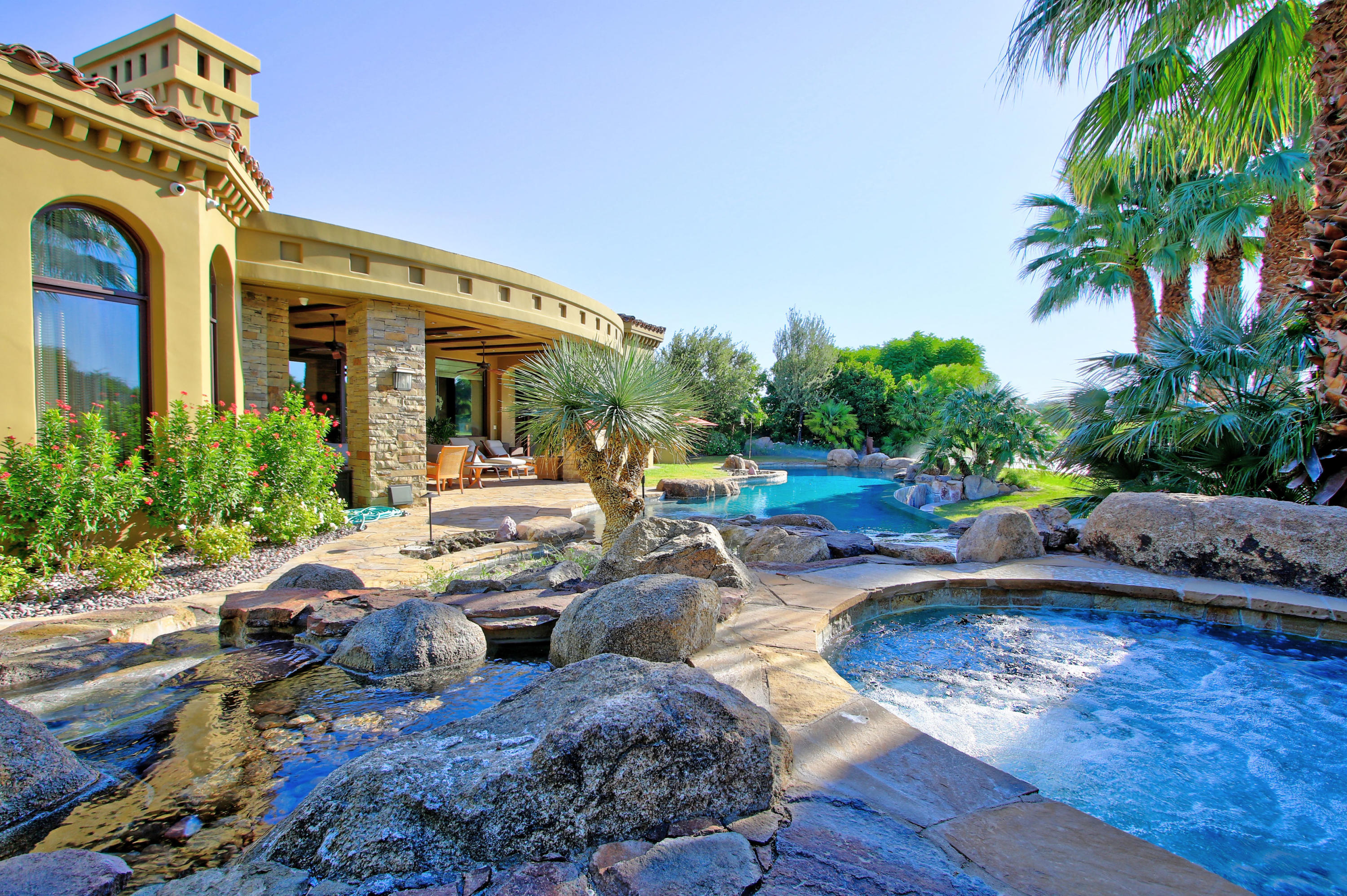 83 Royal St Georges Way Rancho Mirage, CA 92270 - Photo 109 of 123 a view of a house with backyard and sitting area