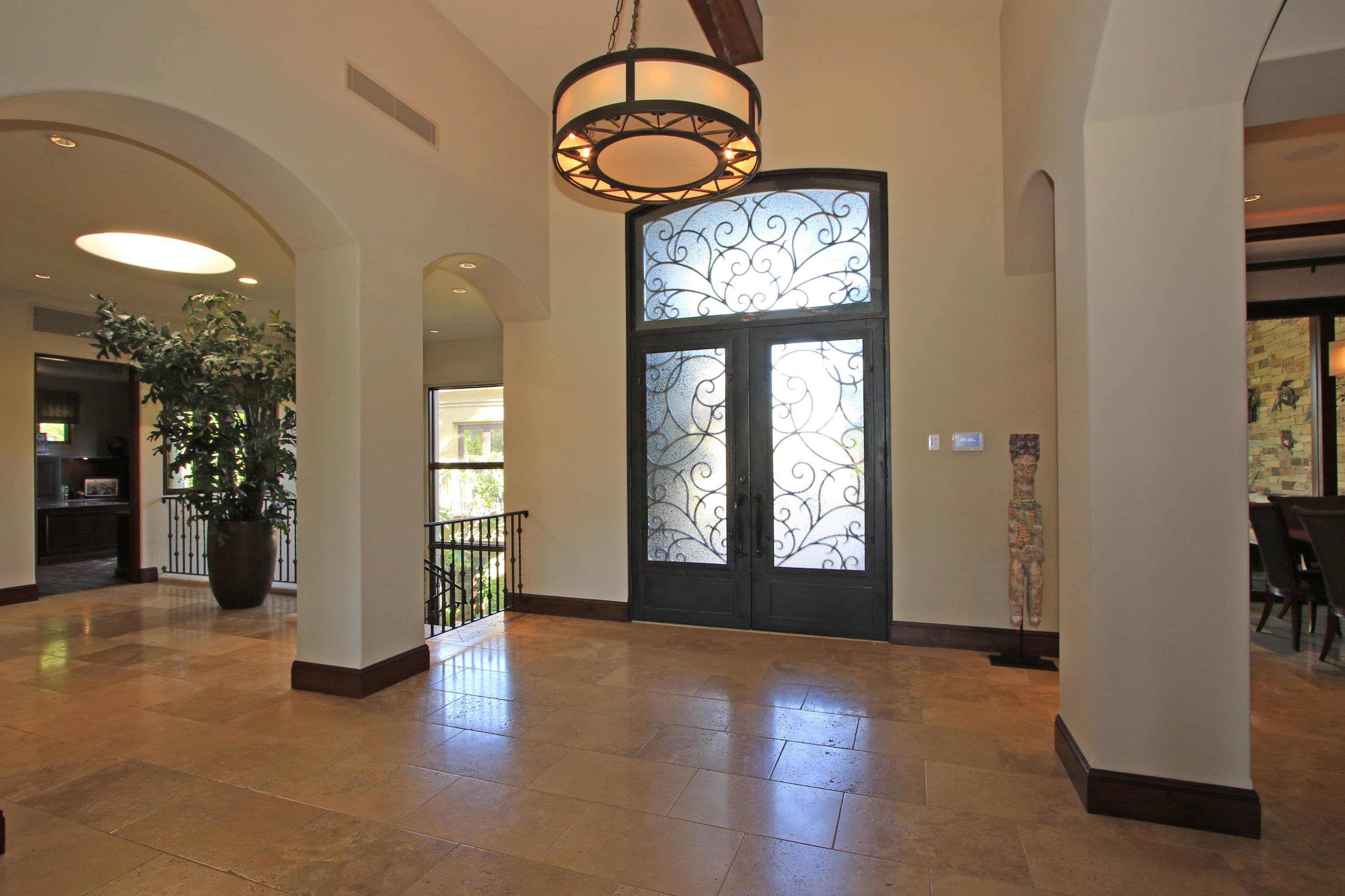 83 Royal St Georges Way Rancho Mirage, CA 92270 - Photo 12 of 123 a view of an entryway with a chandelier