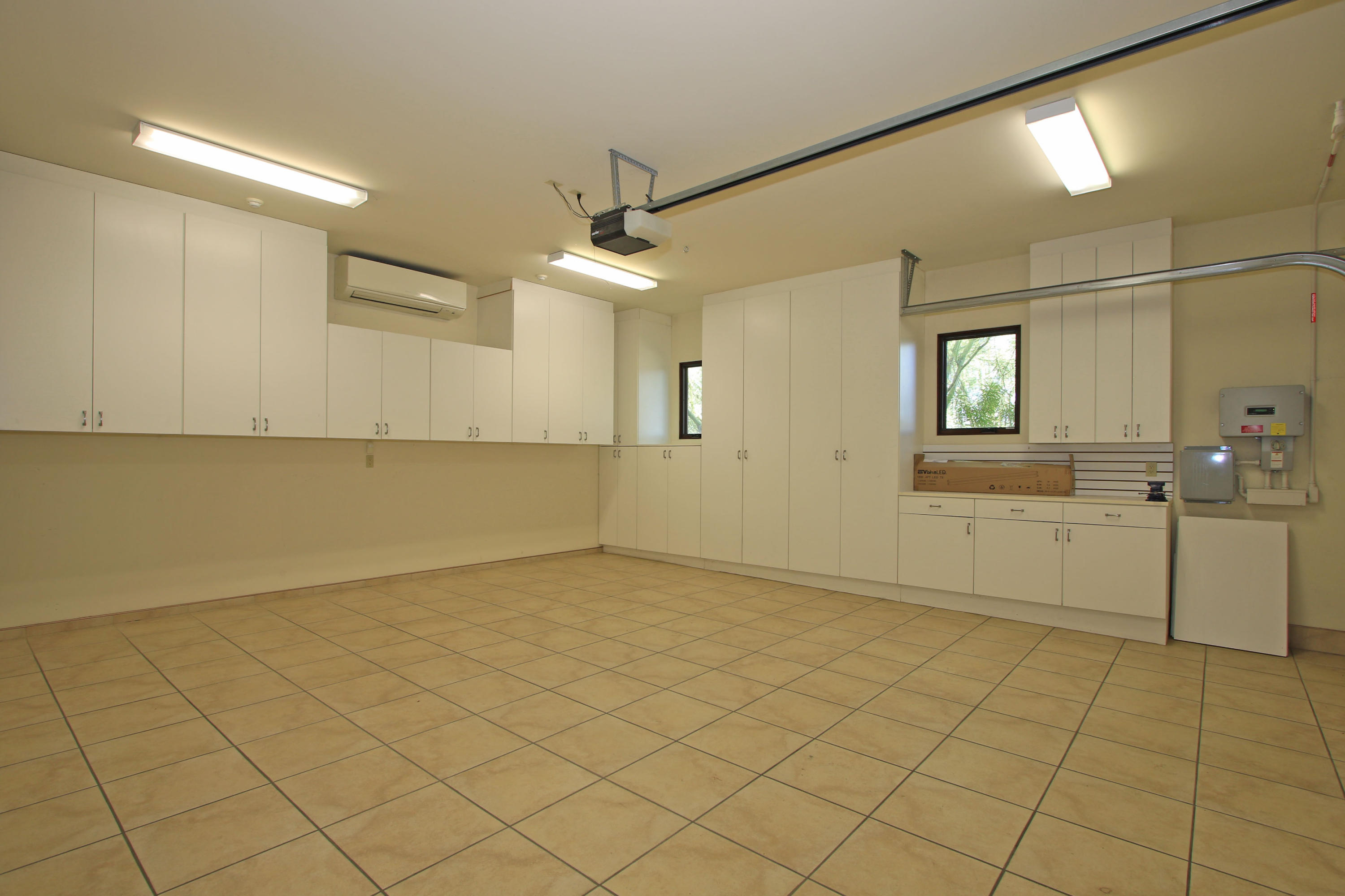 83 Royal St Georges Way Rancho Mirage, CA 92270 - Photo 122 of 123 a view of a kitchen with white cabinets and a sink