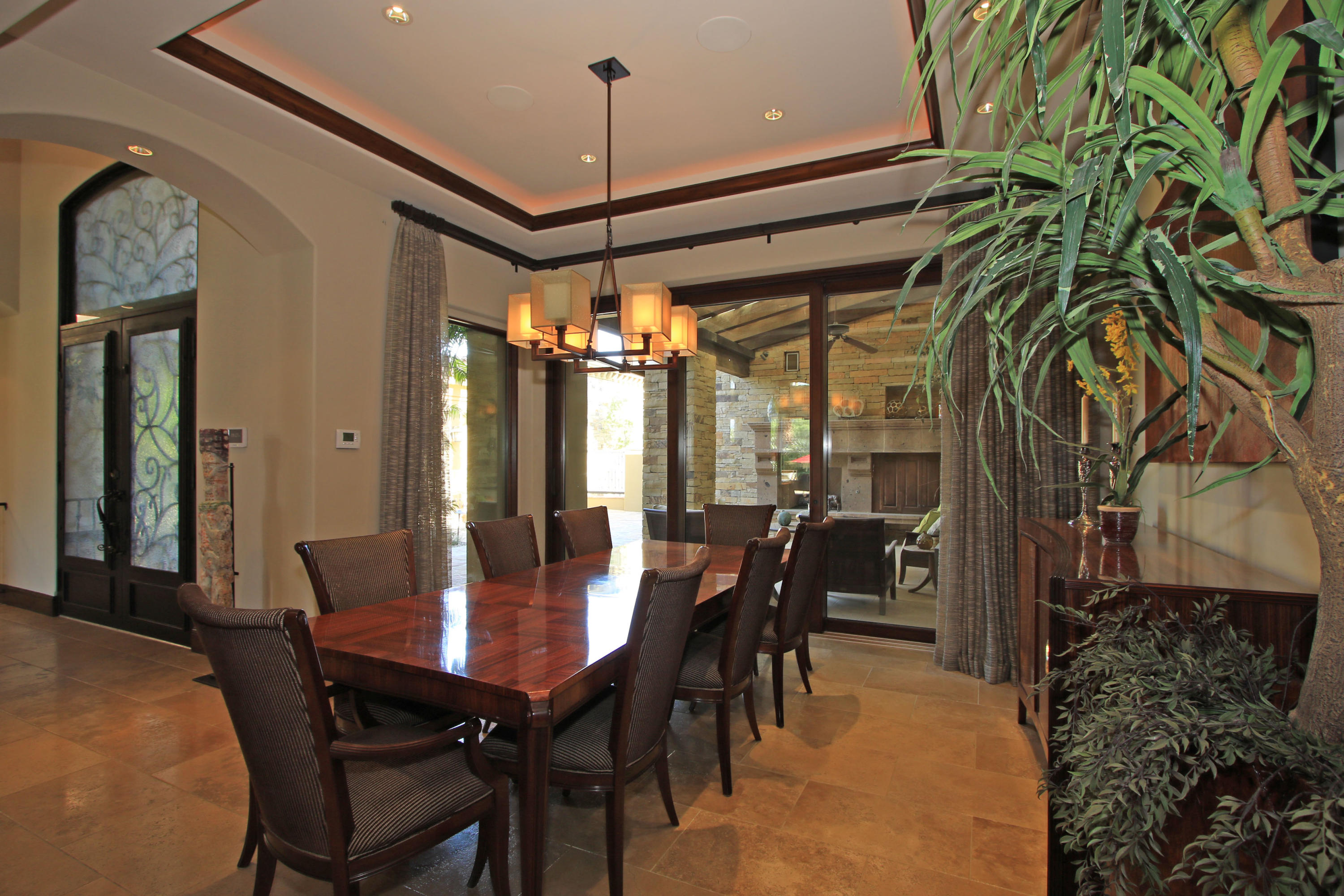 83 Royal St Georges Way Rancho Mirage, CA 92270 - Photo 15 of 123 a view of a dining room with furniture window and outside view