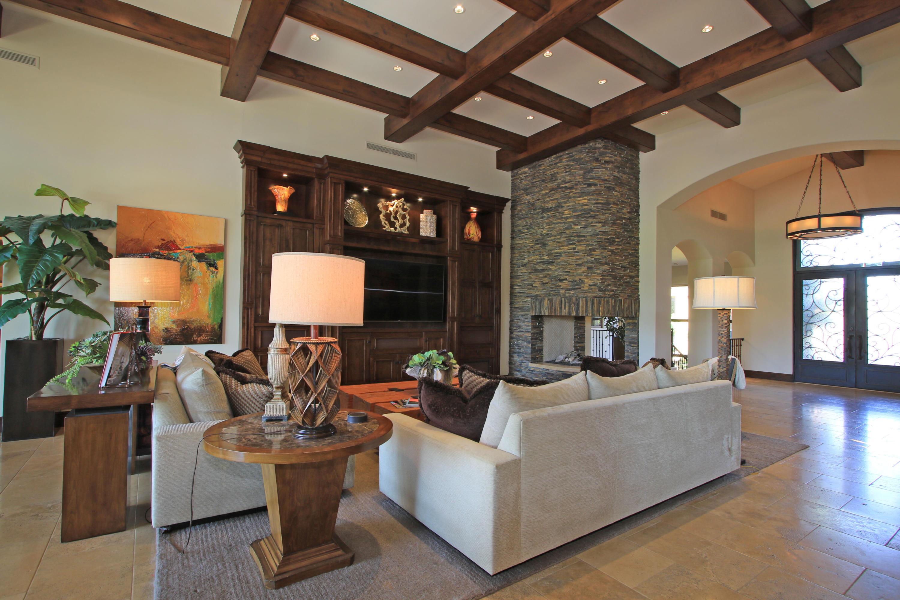 83 Royal St Georges Way Rancho Mirage, CA 92270 - Photo 22 of 123 a living room with furniture and a wooden floor