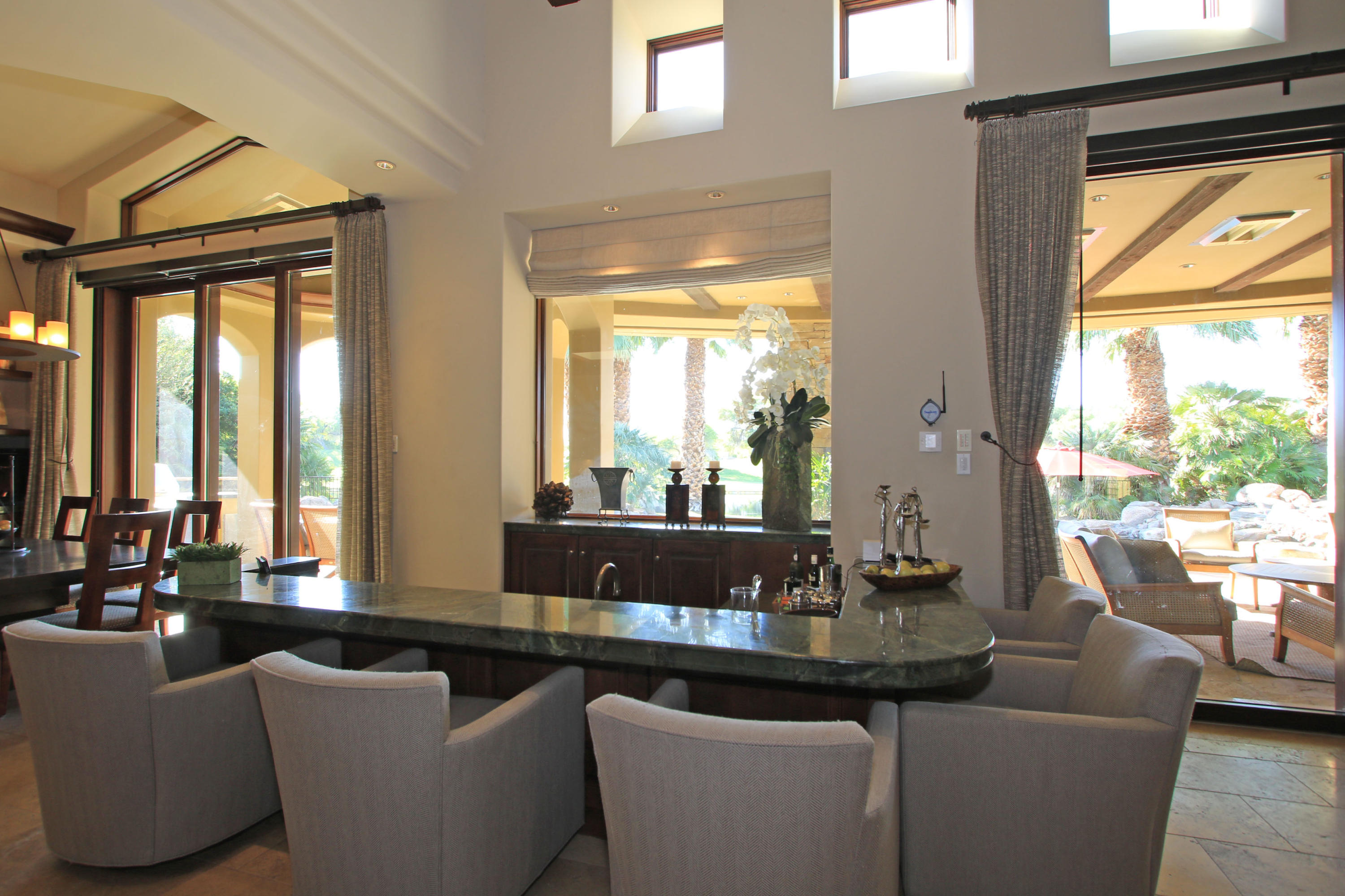 83 Royal St Georges Way Rancho Mirage, CA 92270 - Photo 29 of 123 a living room with furniture and a large window