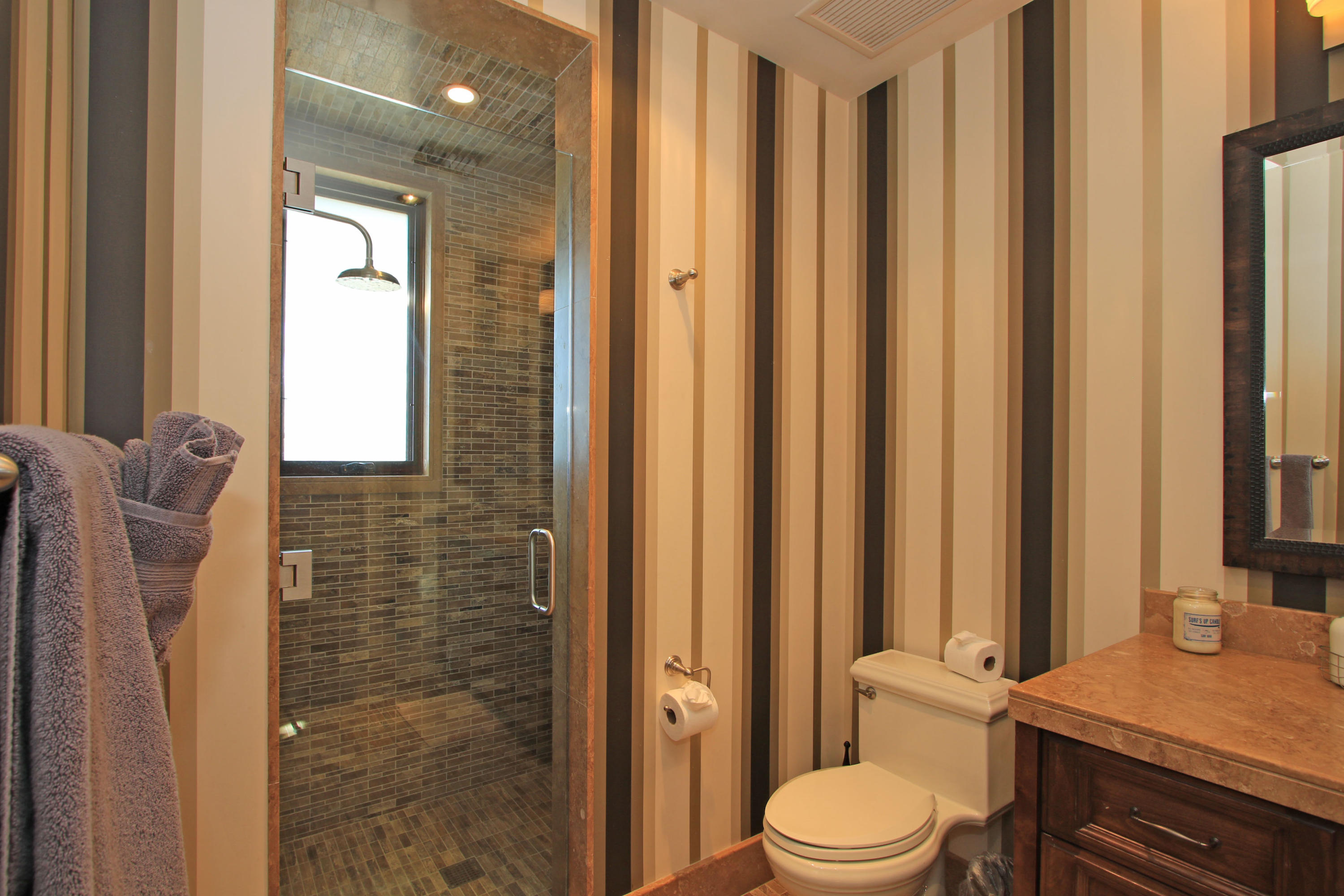 83 Royal St Georges Way Rancho Mirage, CA 92270 - Photo 62 of 123 a bathroom with a granite countertop sink toilet and shower