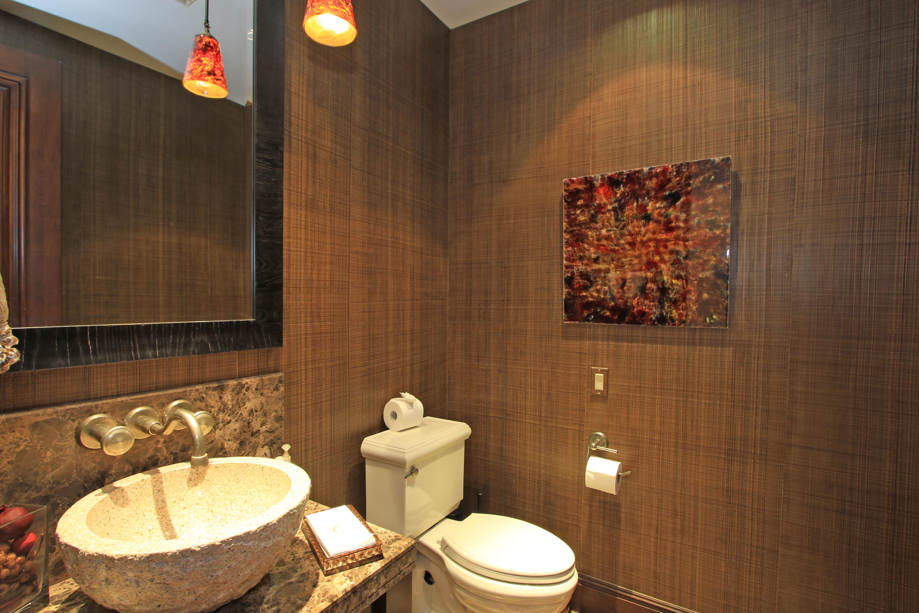 83 Royal St Georges Way Rancho Mirage, CA 92270 - Photo 77 of 123 a bathroom with a toilet a sink and mirror