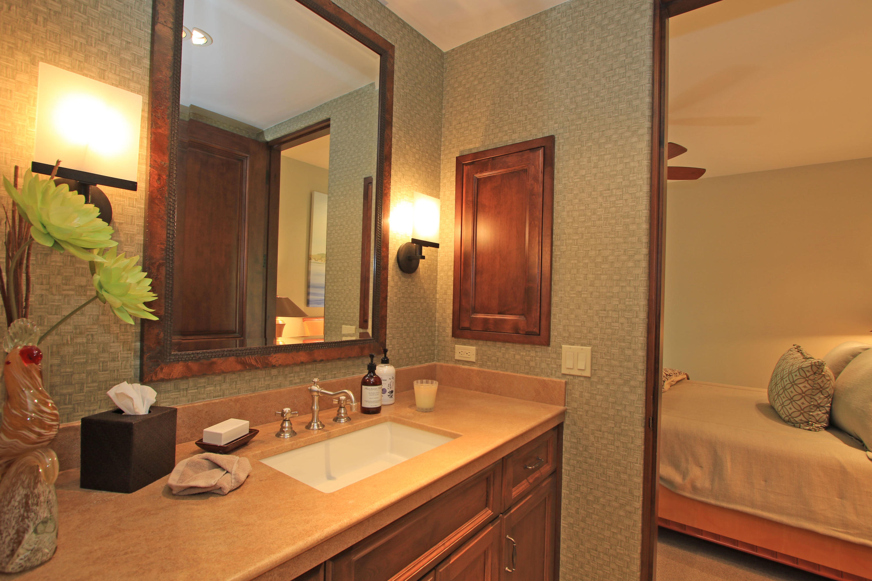 83 Royal St Georges Way Rancho Mirage, CA 92270 - Photo 93 of 123 a bathroom with a granite countertop sink and a mirror