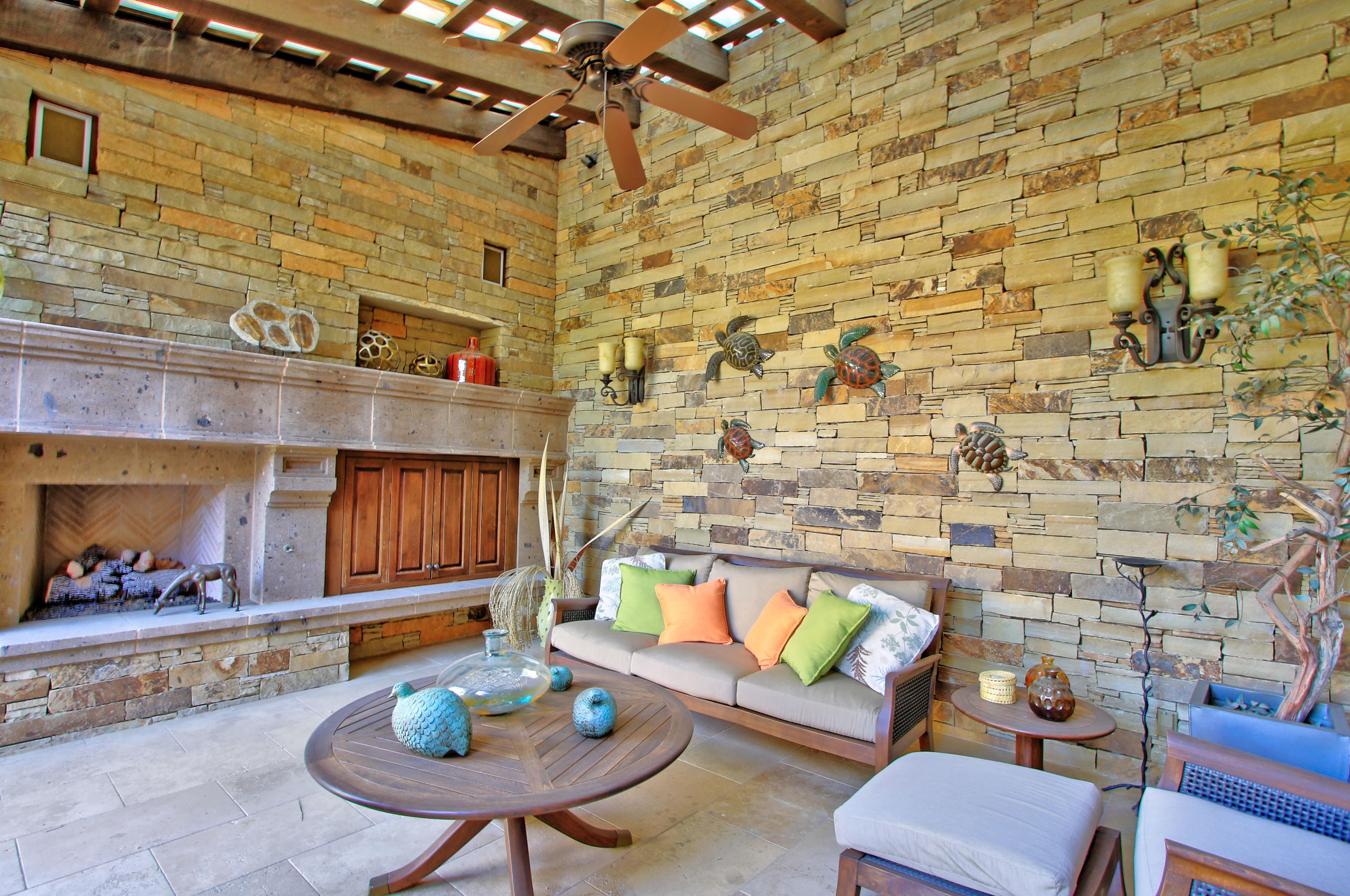 83 Royal St Georges Way Rancho Mirage, CA 92270 - Photo 10 of 123 a living room with furniture and a fireplace