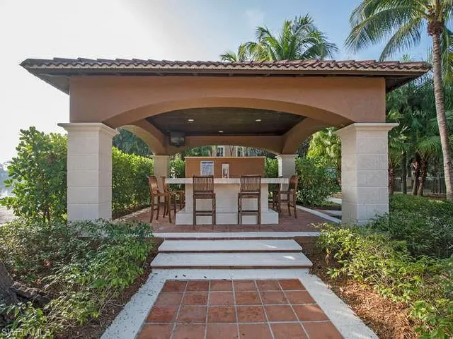 a porch with seating space and yard