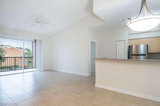 1220 Reserve Way, Unit 305 Naples, FL 34105 - Photo 2 of 20 a view of an empty room and a window