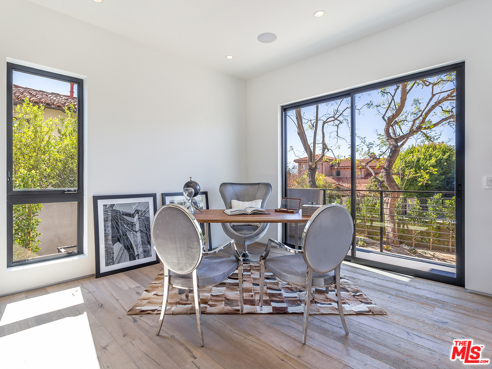 1632 Stradella Road Los Angeles, CA 90077 - Photo 28 of 41 a view of a livingroom with furniture and a window