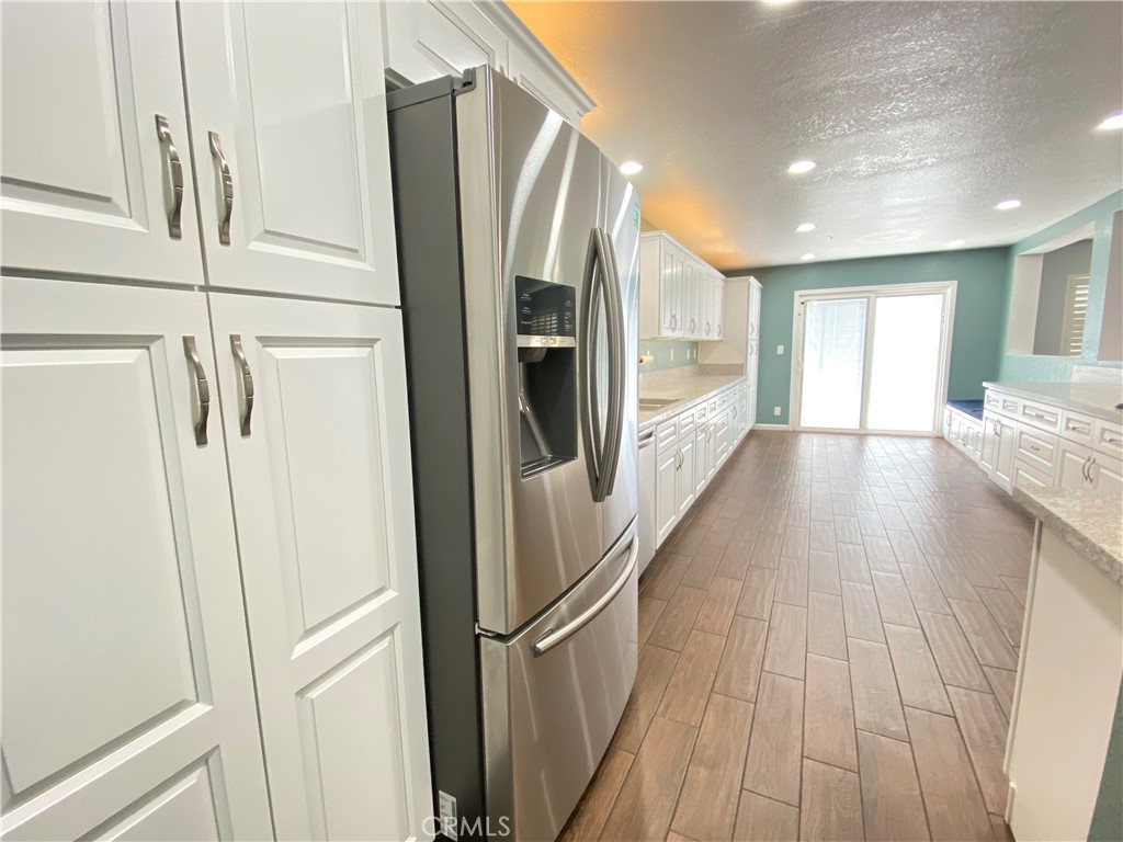 971 Saltcoats Drive Riverside, CA 92508 - Photo 12 of 50 workspace with wooden floor and electronic appliances