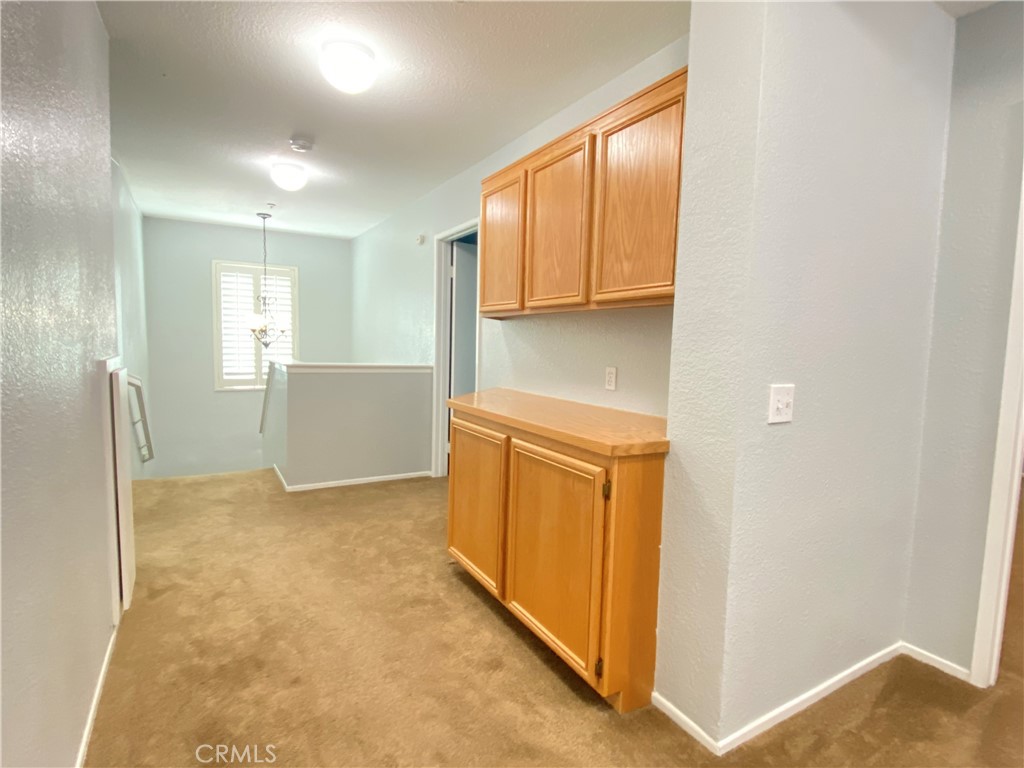 971 Saltcoats Drive Riverside, CA 92508 - Photo 22 of 50 a view of hallway with wooden floor