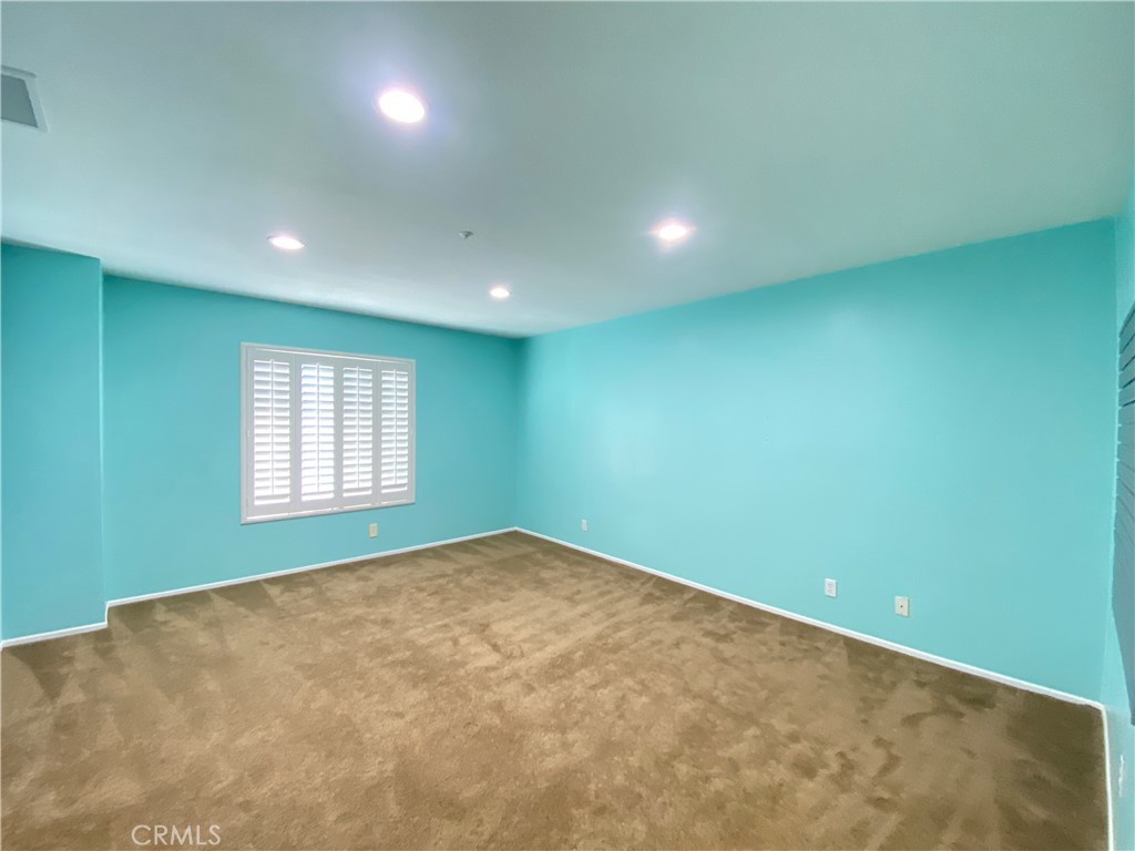 971 Saltcoats Drive Riverside, CA 92508 - Photo 24 of 50 an empty room with windows