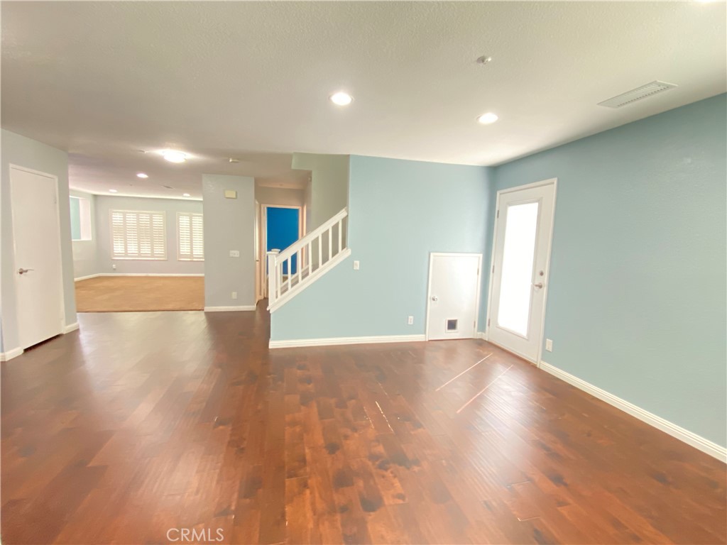 971 Saltcoats Drive Riverside, CA 92508 - Photo 3 of 50 a view of an empty room with wooden floor